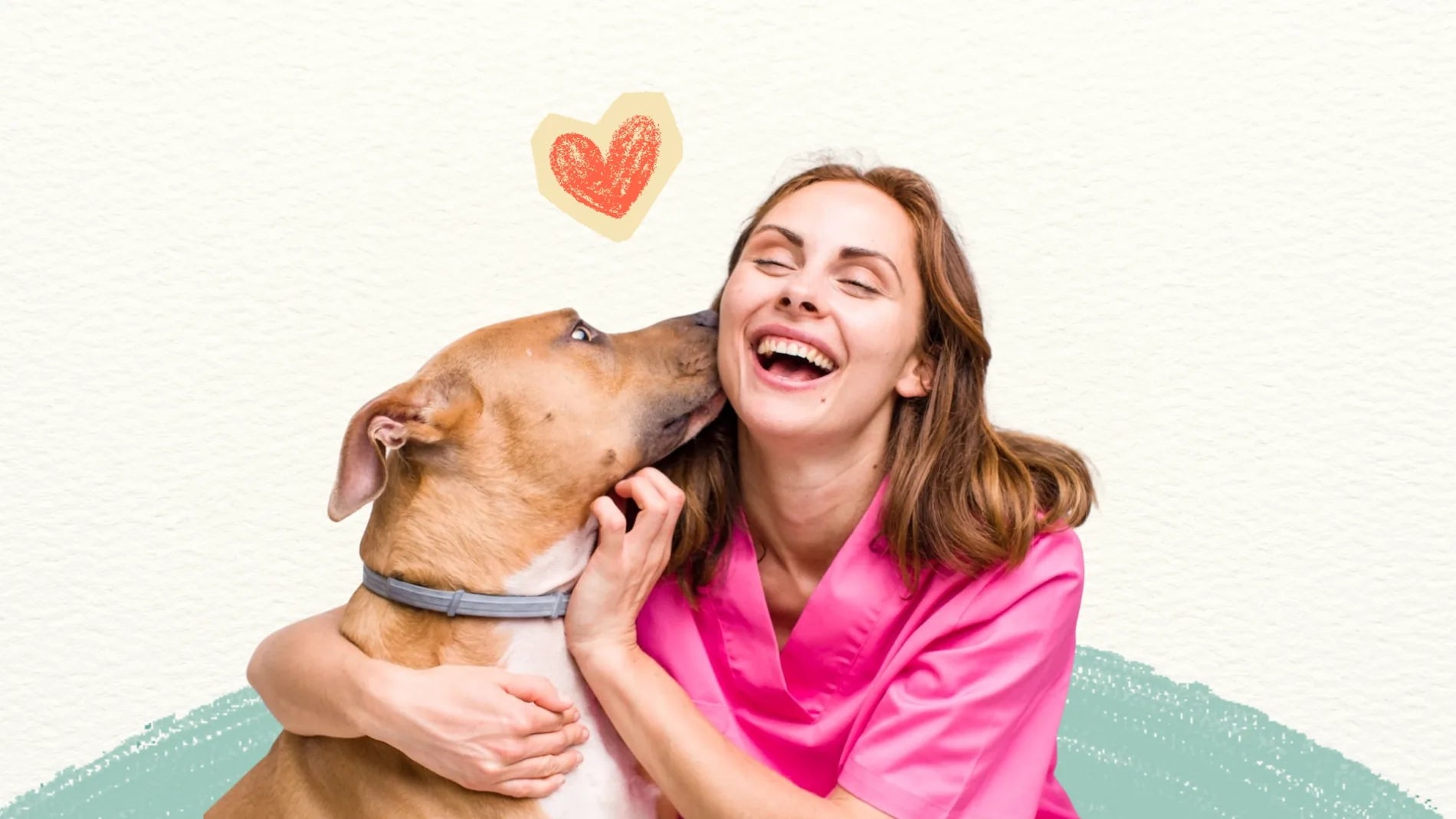 Woman in pink shirt laughing with a dog